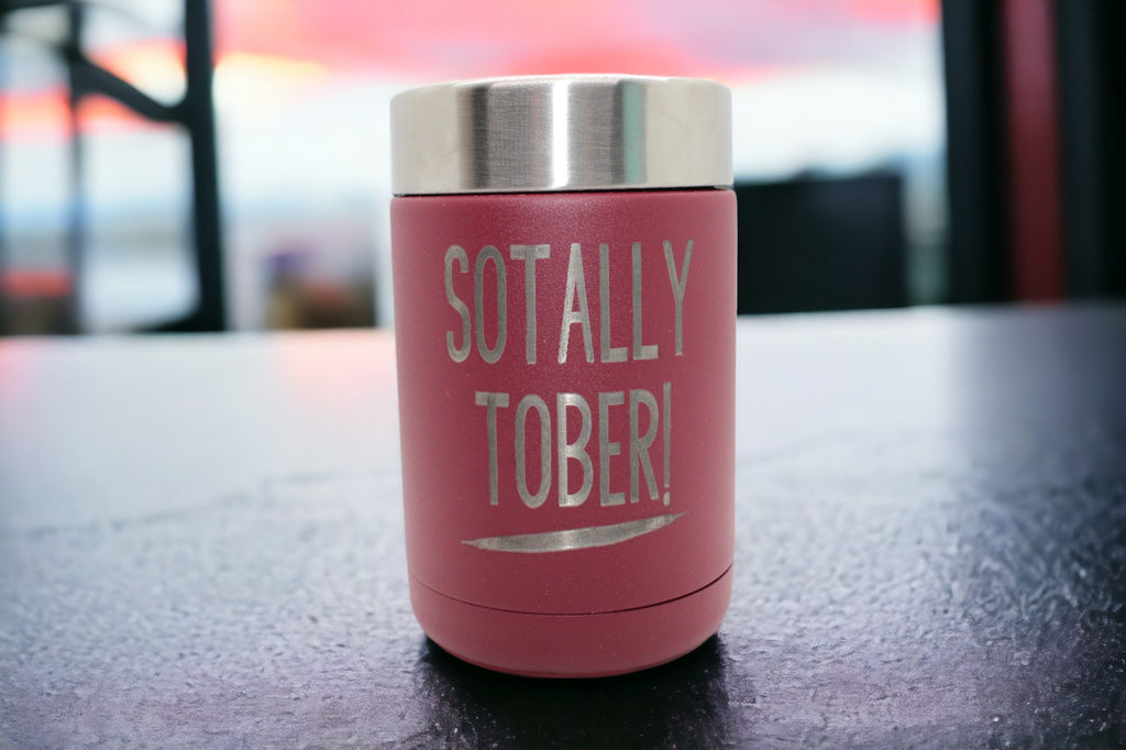 "Image of a 12oz. RTIC can cooler, featuring laser-engraved 'Sotally Tober' and personalized details. The cooler is designed to keep beverages cold for extended periods, with durable construction and insulation to maintain drink temperature. It offers a practical and stylish solution for enjoying canned beverages on the go."